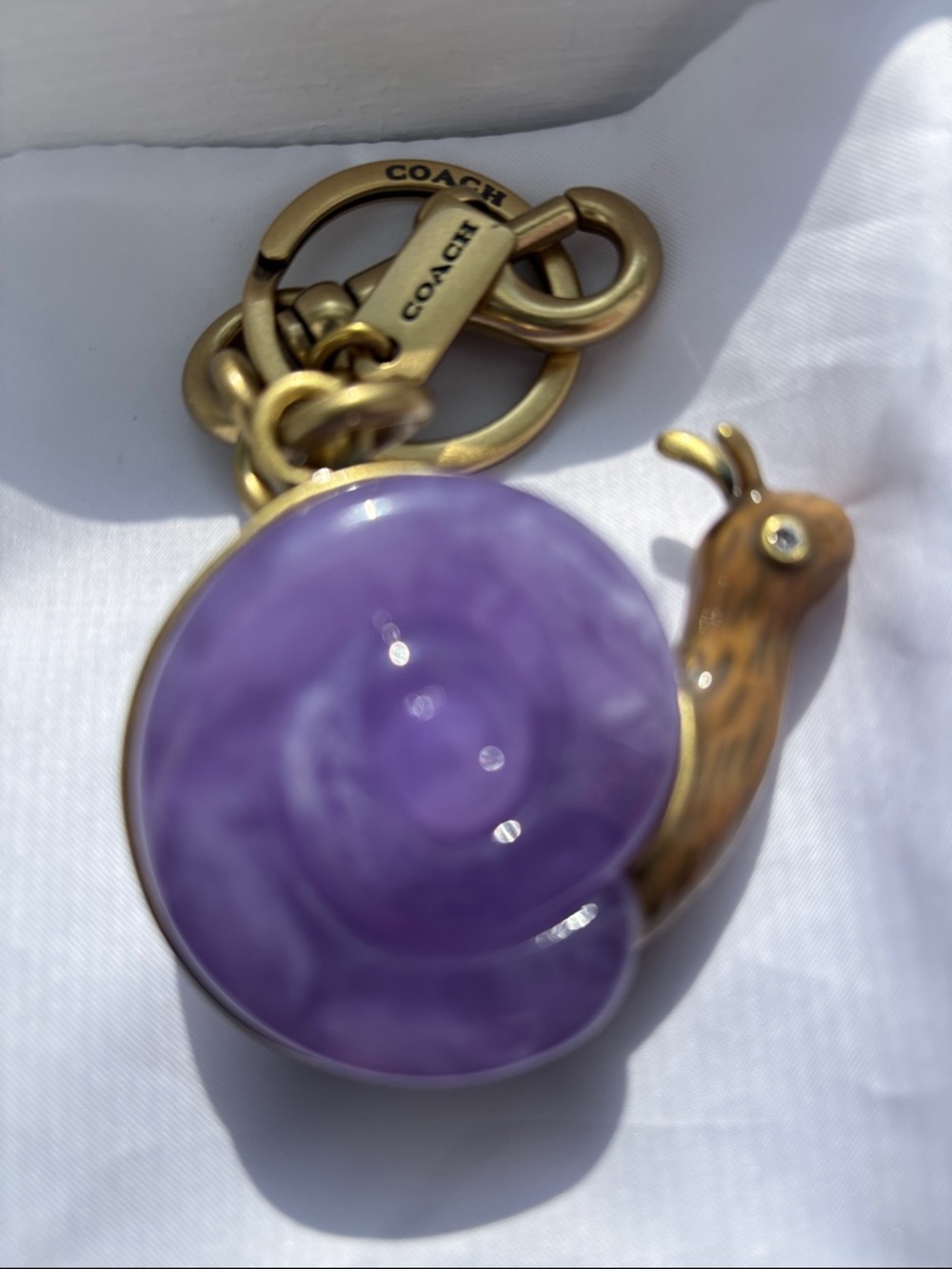 Coach  Snail Bag Charm